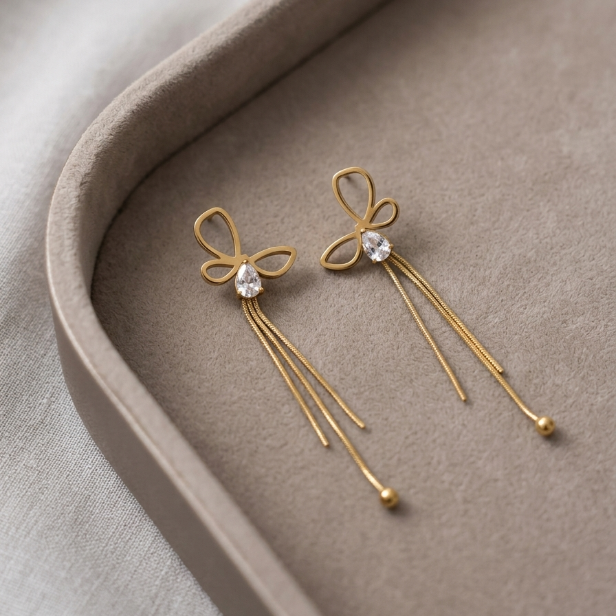 Modern Gold Wire Bow Tassel Earrings | Teardrop Crystal Accent Multi Chain Drop Earrings for Women