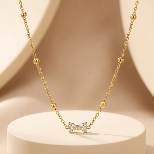Premium Gold Crystal Bow Station Necklace | Geometric Ribbon Cut Pendant Polished Bead Statement Choker for Women