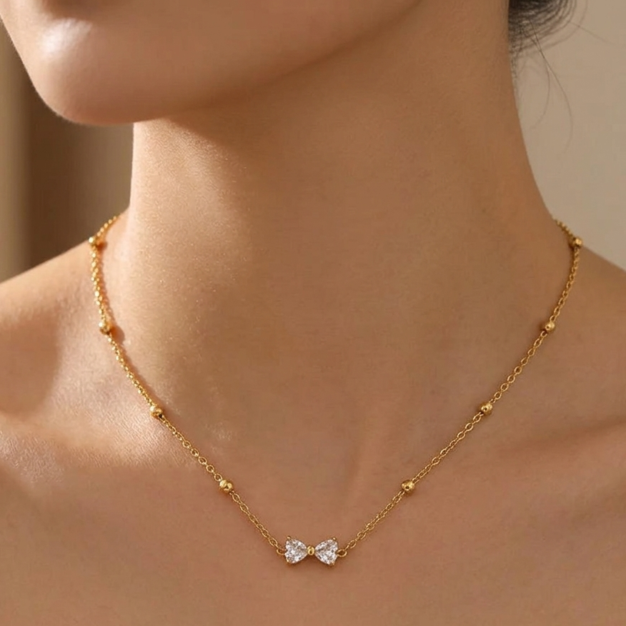 Premium Gold Crystal Bow Station Necklace | Geometric Ribbon Cut Pendant Polished Bead Statement Choker for Women