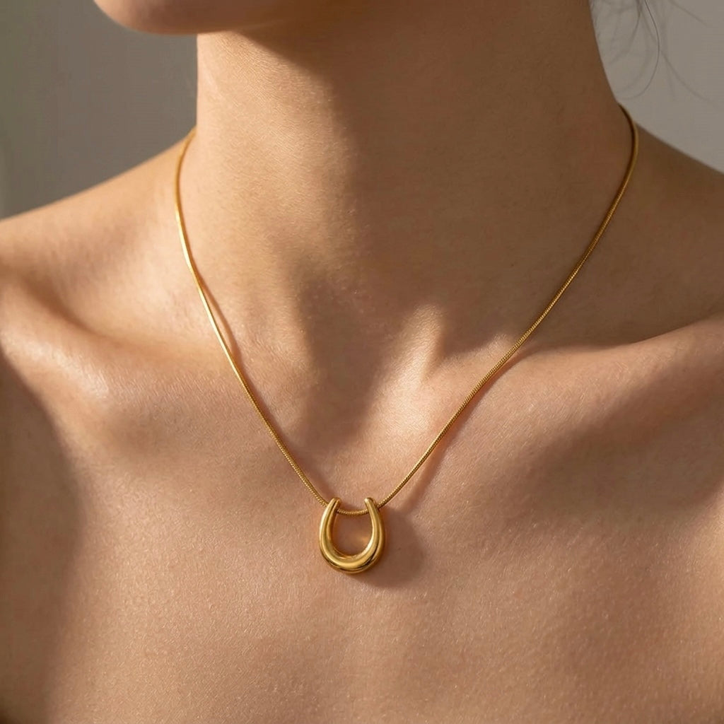 Bold Gold Tubular U-Shape Pendant Necklace | Sculptural Horseshoe Statement Snake Chain Choker for Women